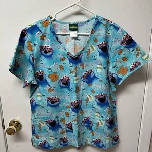 Women’s scrub top, excellent condition.